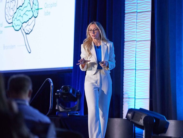 Dr. Sahar Yousef speaking on stage